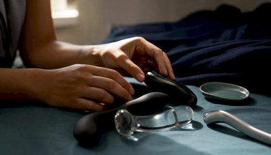 Hands holding body-safe sex toy materials