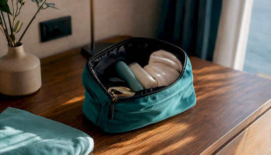 Small vibrator silhouette in toiletry bag