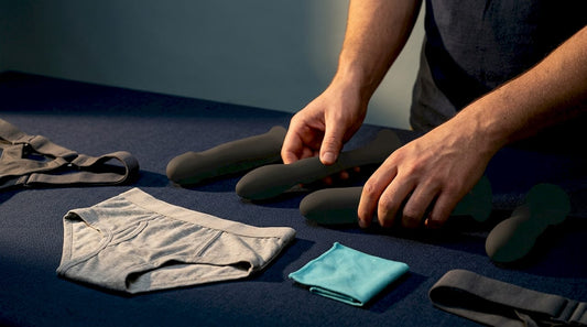 Hands comparing anonymous toy shapes by scenario