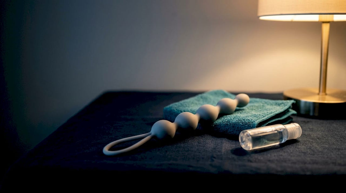 Anonymous graduated beads on navy linen