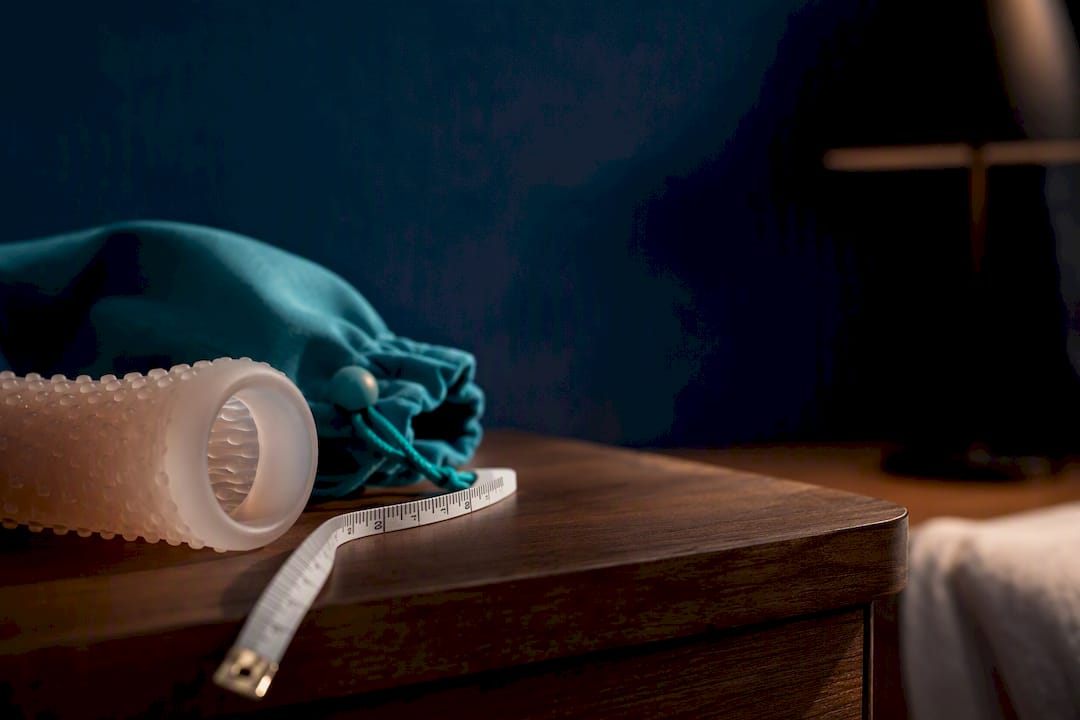 Anonymous sleeve and measuring tape on shelf