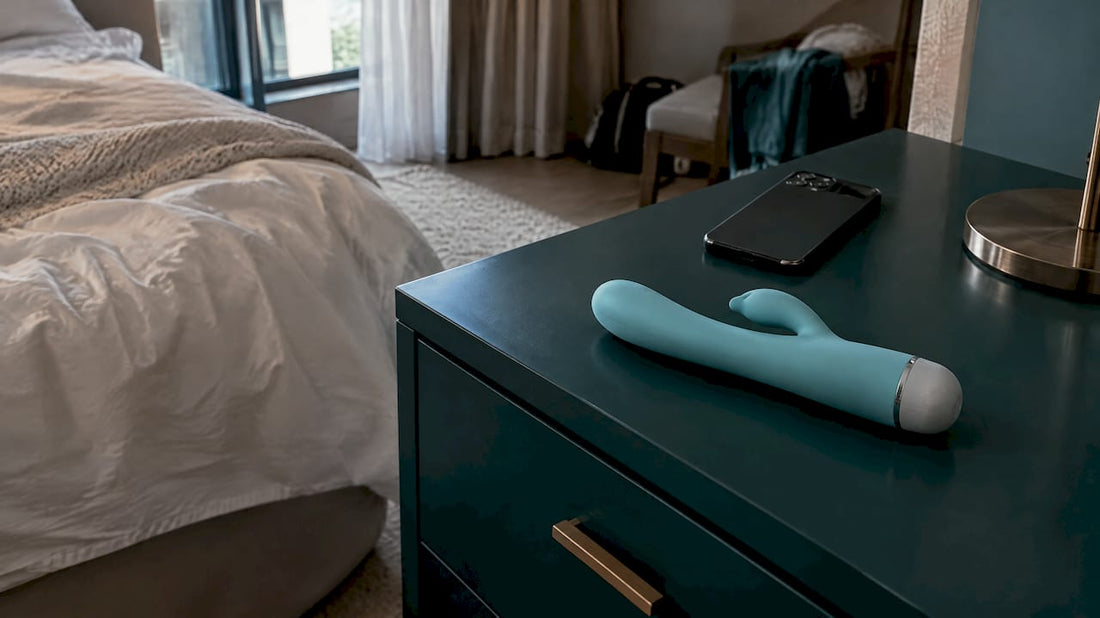 App-controlled vibrator beside a smartphone